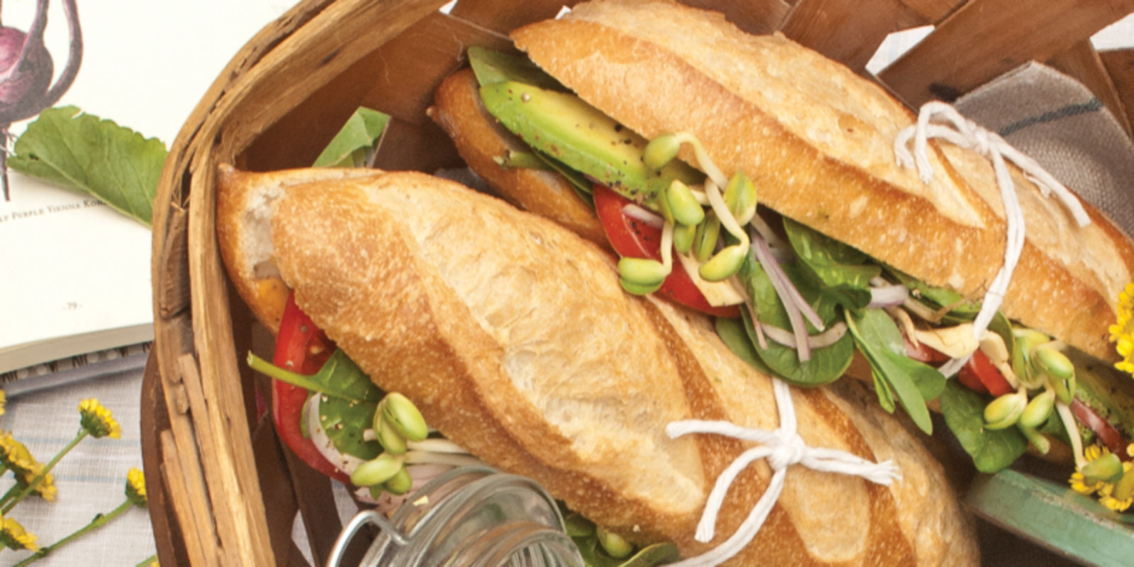 Baguette sandwiches in a picnic basket